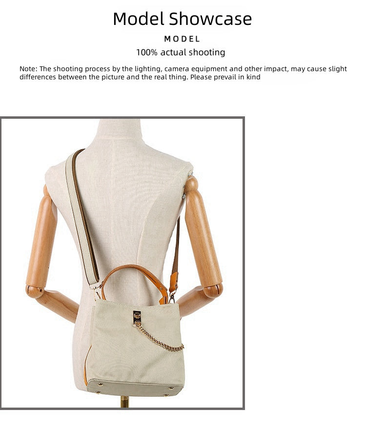 Handbag with leather handle