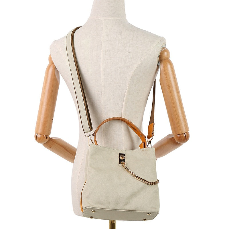 Handbag with leather handle