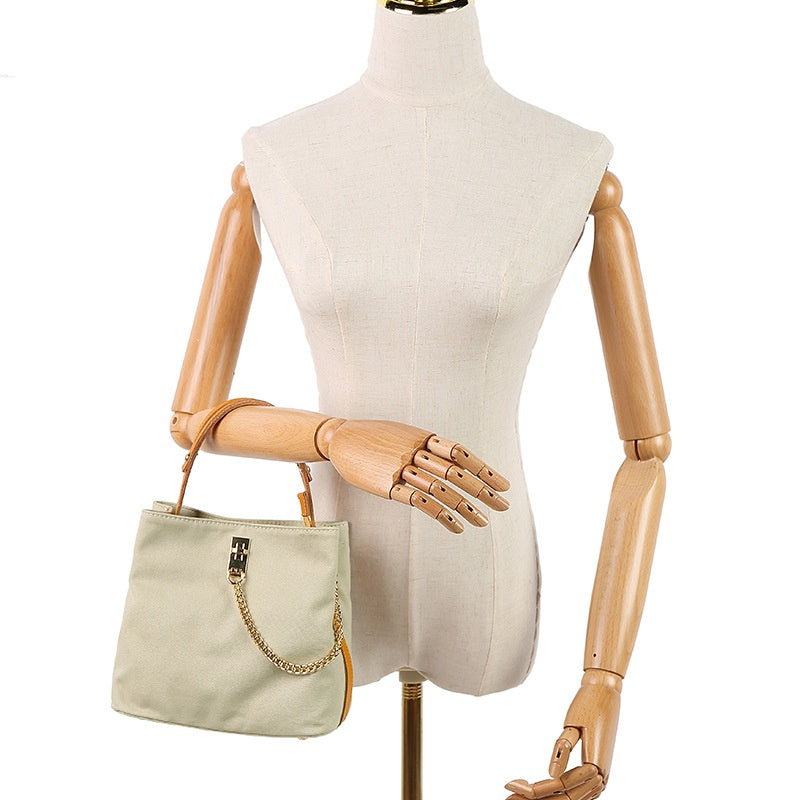 Handbag with leather handle