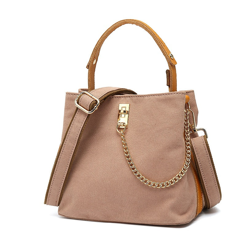 Handbag with leather handle